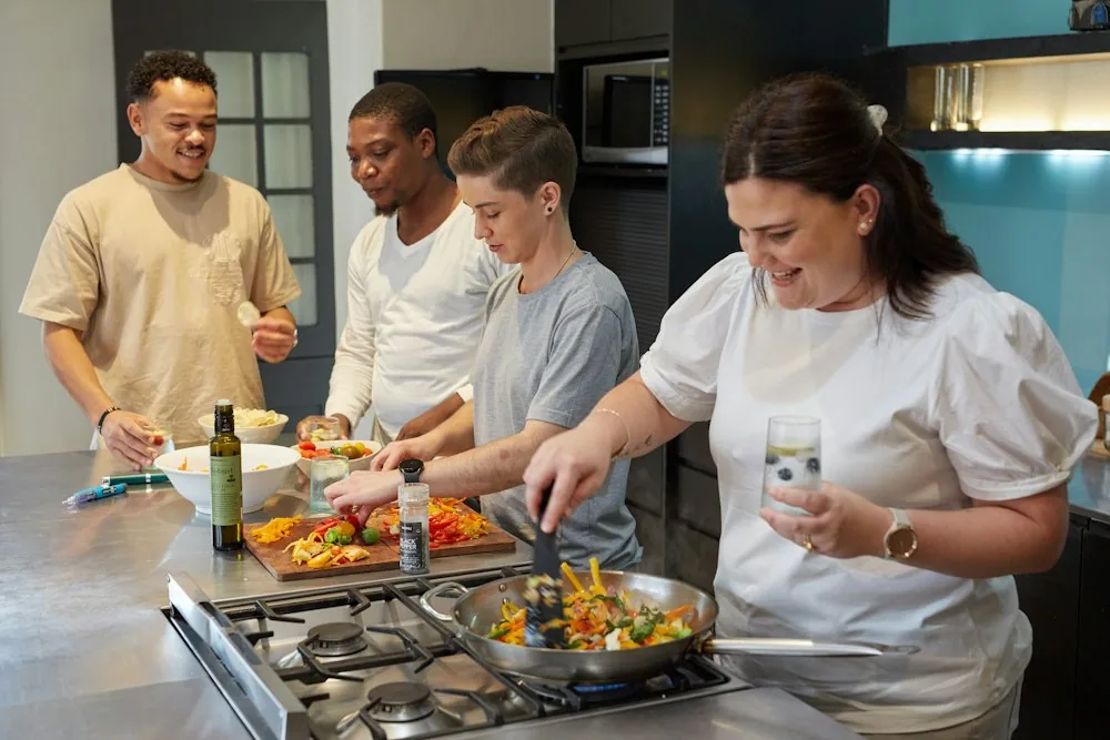 Hands preparing a home-cooked meal in a kitchen